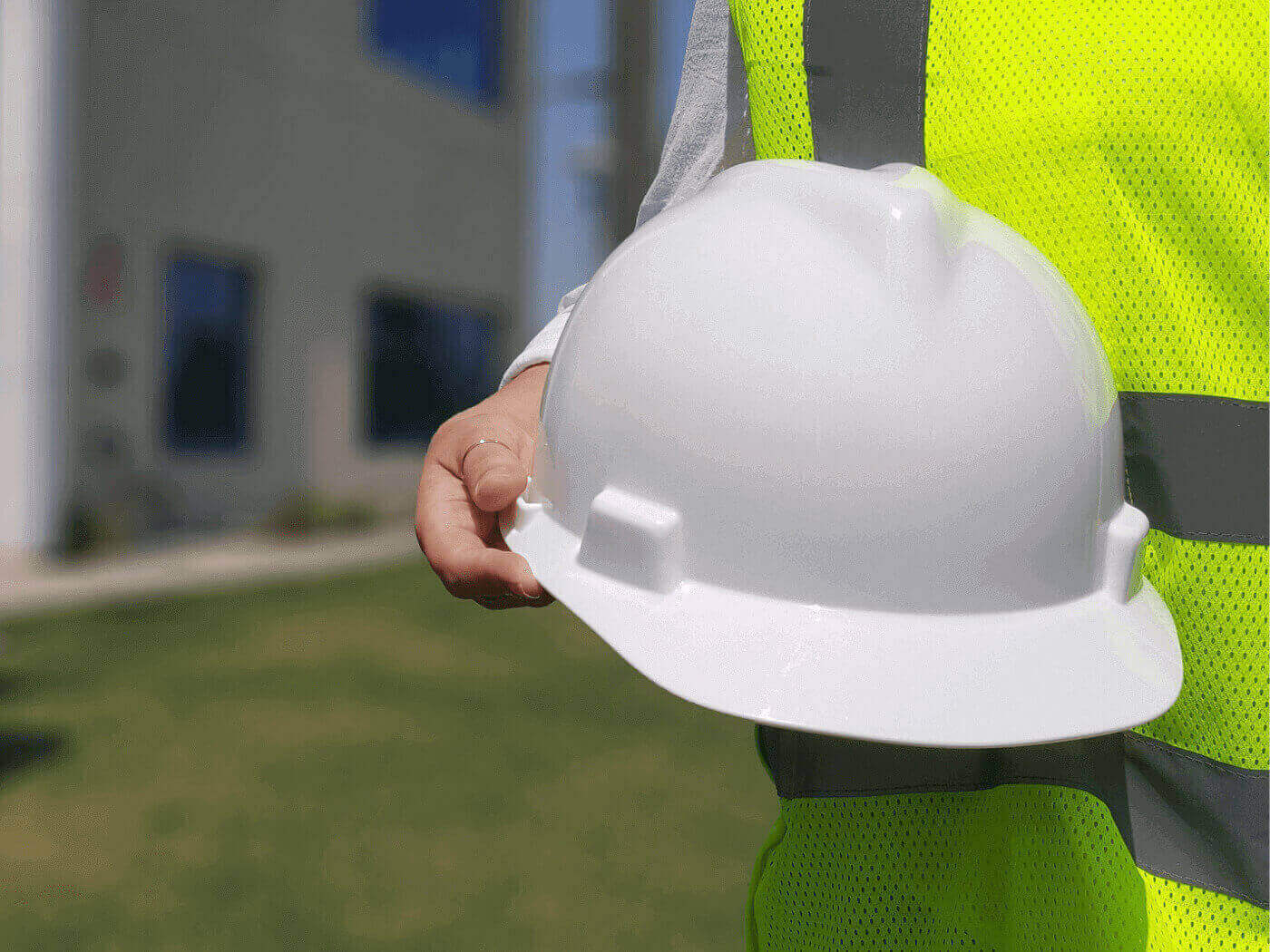 Chinese construction worker with sunhat and hardhat combination